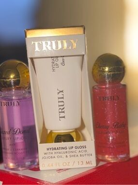 Truly Hydrating Lip Gloss. You get all Coco Cloud, Cherry Baby, Glazed Donut